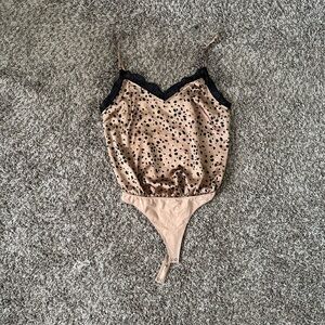 Lace trim bodysuit